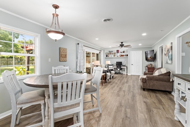 935 Nichols Dr, Beaumont, TX 77706 - dining space featuring an office area, ornamental molding, ceiling fan, light wood-type flooring, and recessed lighting