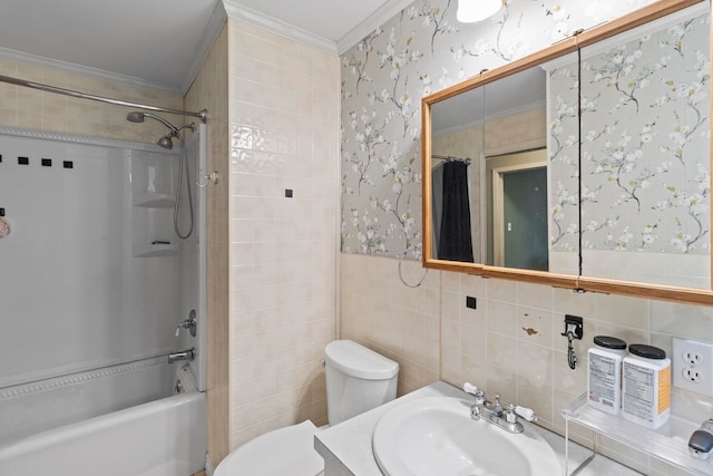 bathroom with a wainscoted wall, toilet, ornamental molding, shower / washtub combination, and wallpapered walls