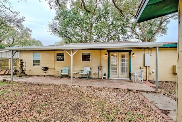 back of house with a patio and french doors