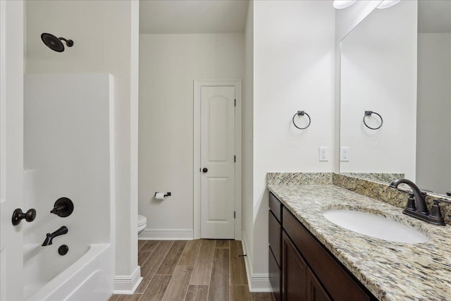 4406 Sequoia, Orange, TX 77630 - bathroom featuring wood finished floors, vanity, toilet,  shower combination, and baseboards