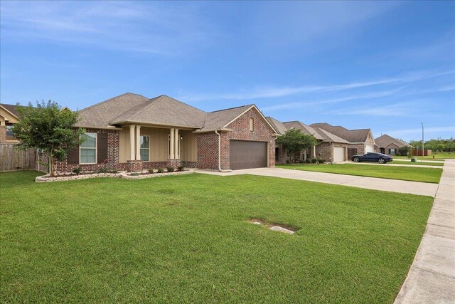 4406 Sequoia, Orange, TX 77630 - view of front facade featuring brick siding, concrete driveway, a garage, and roof with shingles