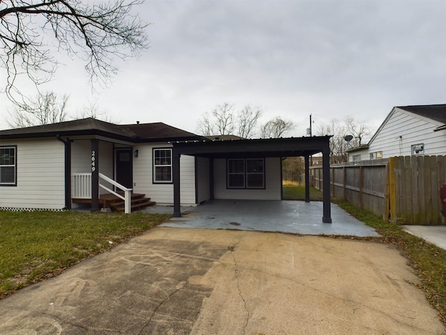 view of front of house with a carport