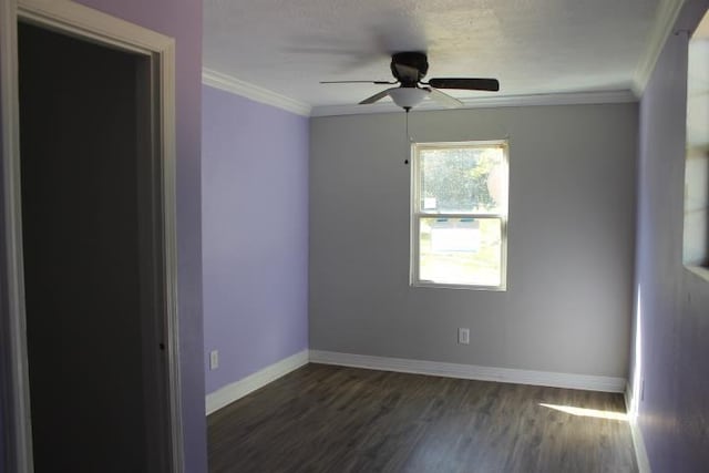 empty room with dark wood-type flooring, ceiling fan, and ornamental molding