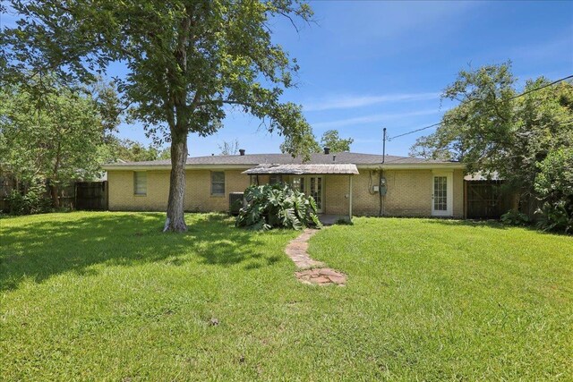 1336 Beagle Rd, Orange, TX 77632 - back of property with brick siding