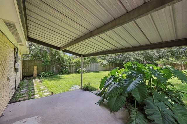 1336 Beagle Rd, Orange, TX 77632 - fenced backyard with a patio area