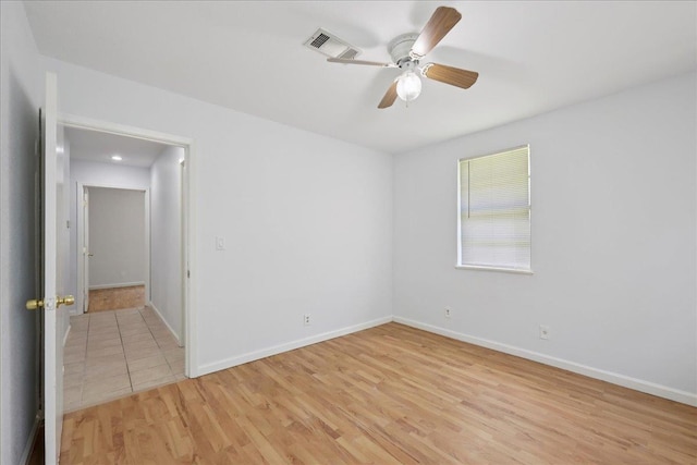 1336 Beagle Rd, Orange, TX 77632 - empty room with light wood-type flooring and a ceiling fan