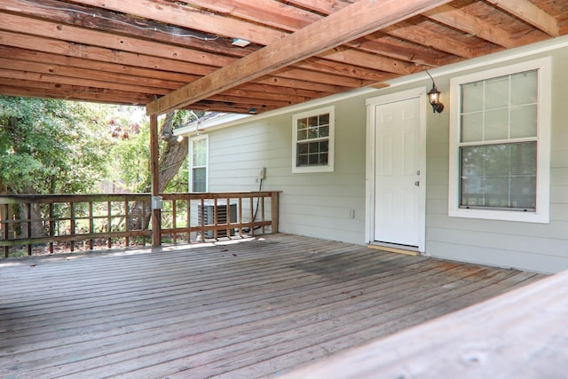 wooden deck featuring a pergola