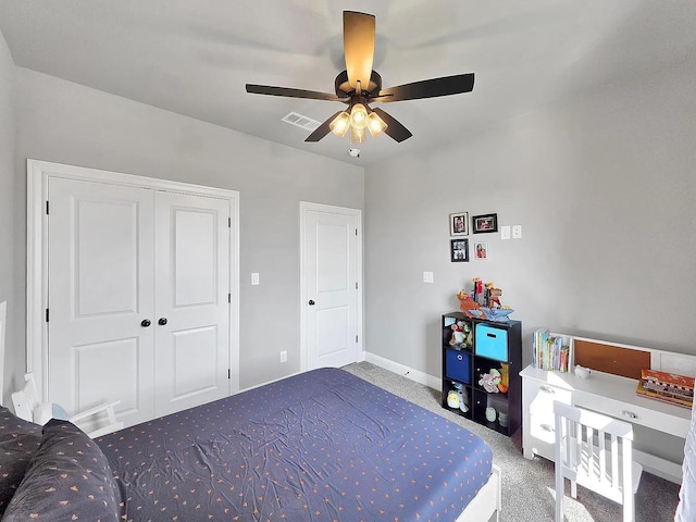 10340 Dominion Ranch Dr, Port Arthur, TX 77640 - bedroom with baseboards, a ceiling fan, and a closet
