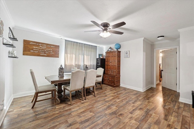 1407 N 15th St, Nederland, TX 77627 - dining space with ornamental molding, ceiling fan, wood finished floors, and baseboards