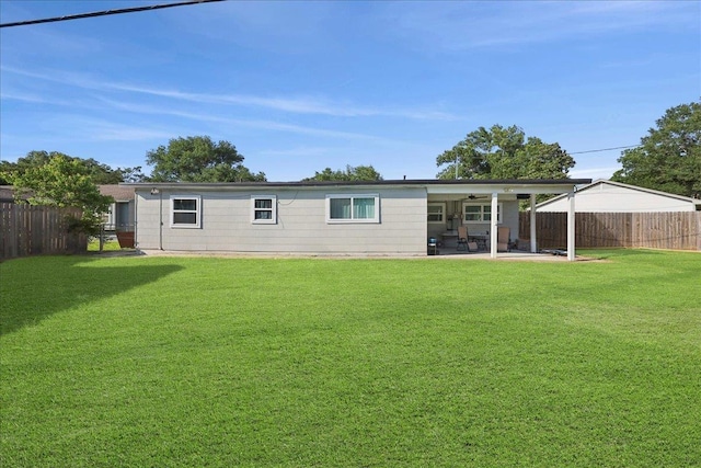 1407 N 15th St, Nederland, TX 77627 - rear view of house with a patio area and a ceiling fan