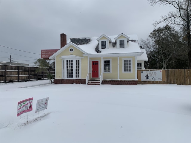 view of new england style home