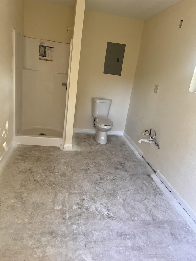 bathroom featuring toilet, a shower, and electric panel