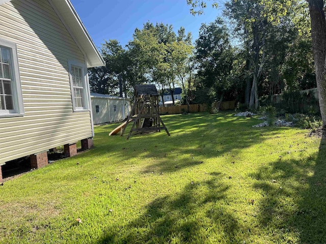 view of yard with a playground