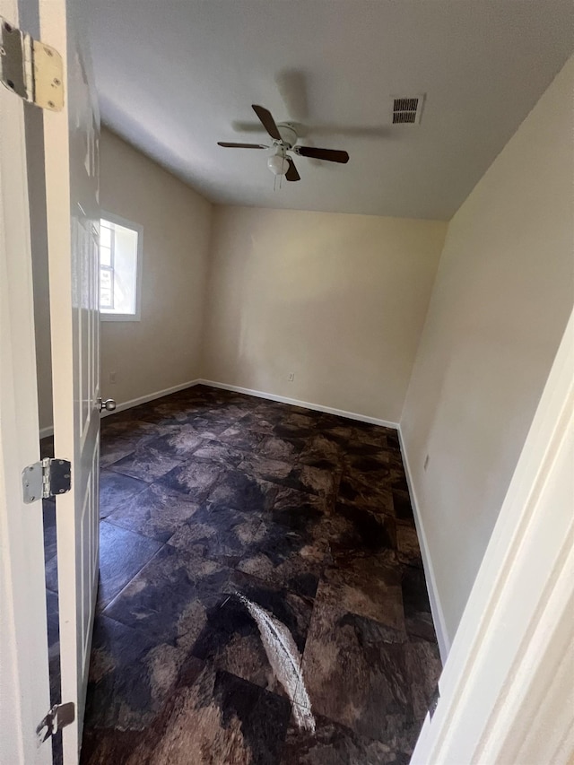 unfurnished room featuring ceiling fan