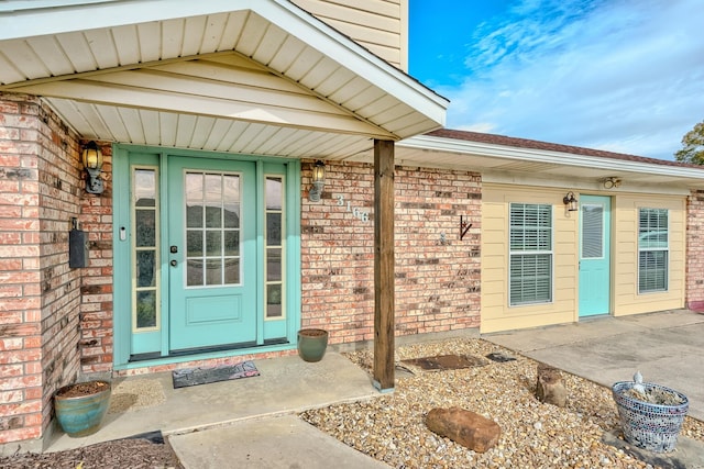 entrance to property with a patio area