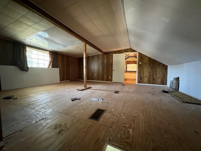 bonus room with vaulted ceiling