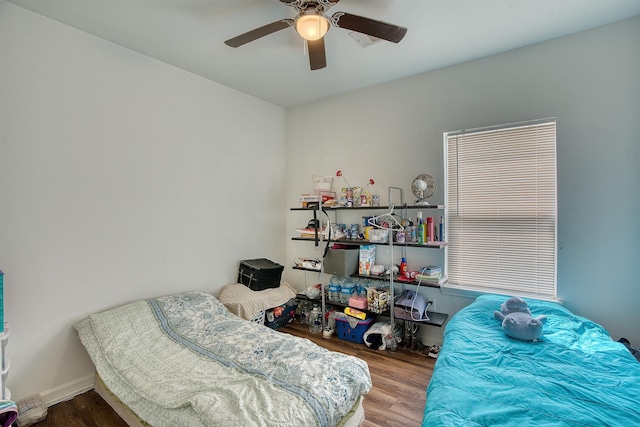 227 County Road 852, Buna, TX 77612 - bedroom featuring wood finished floors and ceiling fan