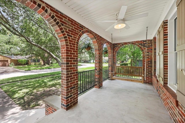145 Manor St, Beaumont, TX 77706 - porch featuring a ceiling fan