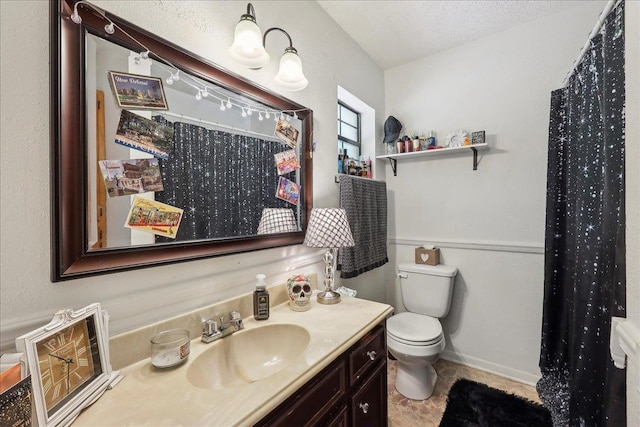 full bathroom featuring toilet and vanity