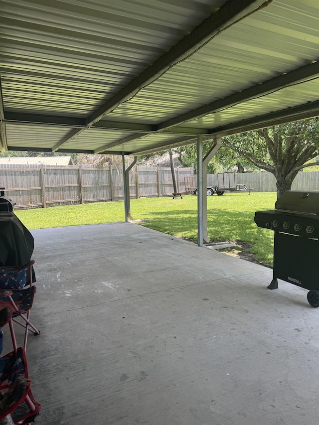 2211 Summer Oak Ln, Orange, TX 77632 - fenced backyard with a patio area and area for grilling