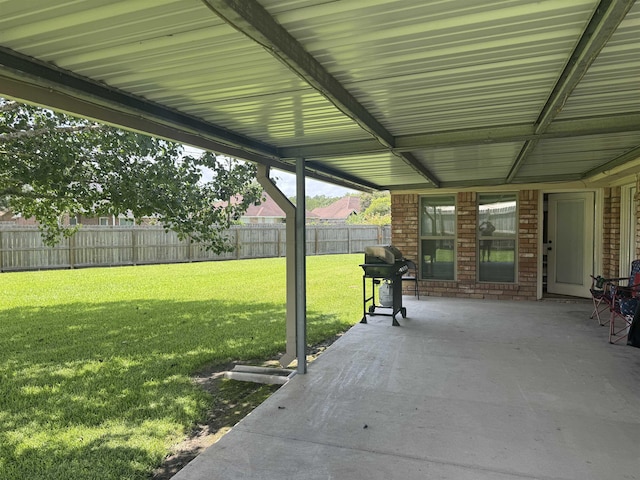 2211 Summer Oak Ln, Orange, TX 77632 - fenced backyard with a patio and grilling area