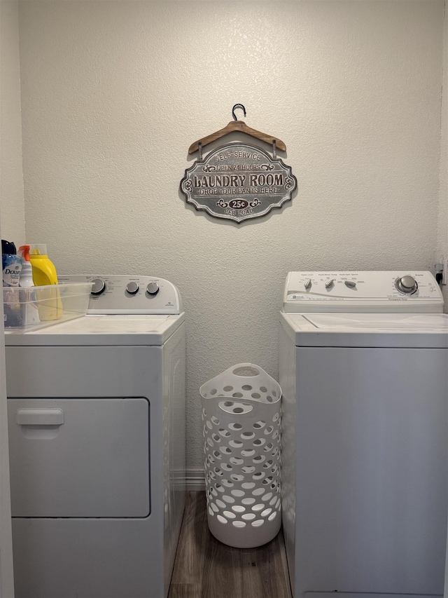 2211 Summer Oak Ln, Orange, TX 77632 - laundry room with washing machine and dryer and wood finished floors