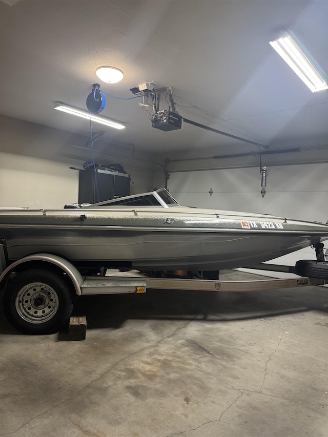 2211 Summer Oak Ln, Orange, TX 77632 - garage featuring a garage door opener