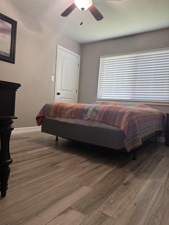 2211 Summer Oak Ln, Orange, TX 77632 - bedroom featuring wood finished floors and a ceiling fan