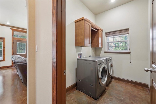 1291 Beachrock Dr, Brookeland, TX 75931 - laundry room with cabinet space and separate washer and dryer