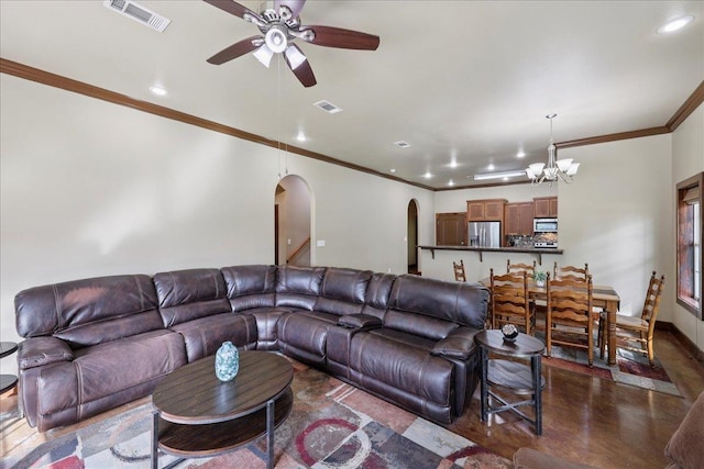 1291 Beachrock Dr, Brookeland, TX 75931 - living room featuring arched walkways, ceiling fan, ornamental molding, recessed lighting, and a chandelier