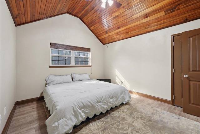 1291 Beachrock Dr, Brookeland, TX 75931 - bedroom featuring wooden ceiling, vaulted ceiling, wood finished floors, and a ceiling fan