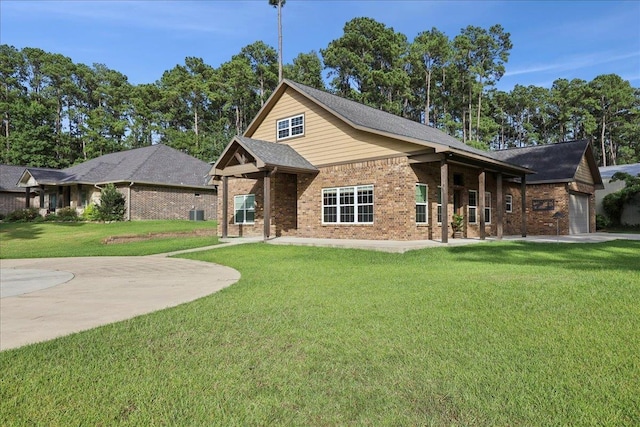 1291 Beachrock Dr, Brookeland, TX 75931 - view of front of home with brick siding and a front lawn