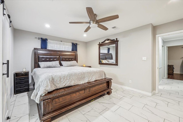 5938 W Madison Blvd, Groves, TX 77619 - bedroom featuring marble look tile flooring, recessed lighting, baseboards, a barn door, and a ceiling fan