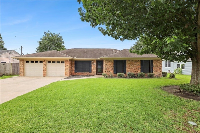 5938 W Madison Blvd, Groves, TX 77619 - ranch-style house with an attached garage, concrete driveway, and brick siding