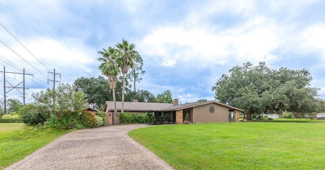 ranch-style house with a front lawn