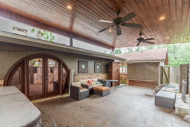 view of patio with ceiling fan and french doors