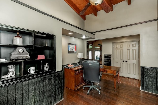 office space with vaulted ceiling with beams, ceiling fan, wood ceiling, and dark wood-type flooring