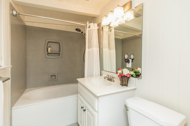 full bathroom with beamed ceiling, shower / tub combo, vanity, and toilet