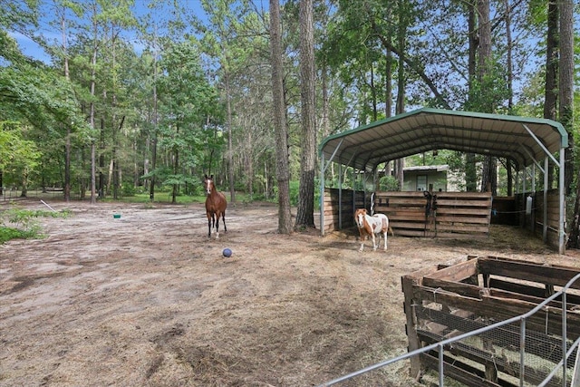 view of yard with a carport