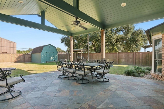 view of patio / terrace featuring a storage unit and ceiling fan