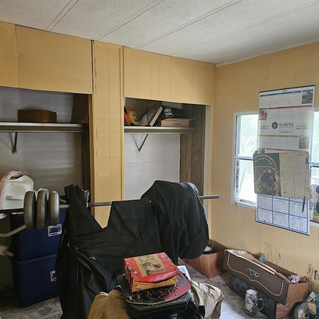 interior space featuring wood walls