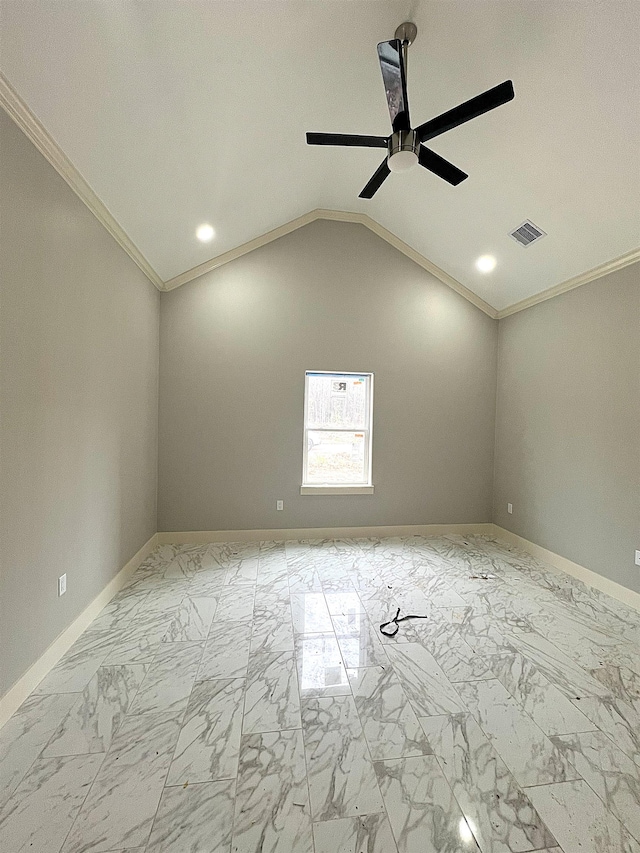 spare room featuring crown molding, lofted ceiling, and ceiling fan