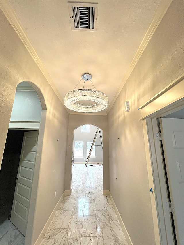 hallway with crown molding