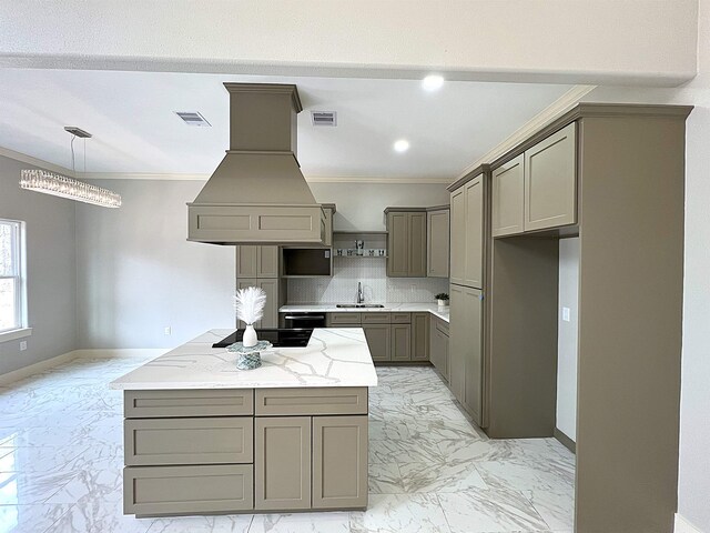 dining area featuring crown molding and sink