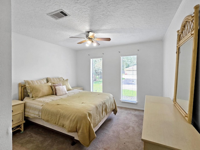 1940 Sams Way, Beaumont, TX 77706 - bedroom with carpet flooring, a ceiling fan, and a textured ceiling