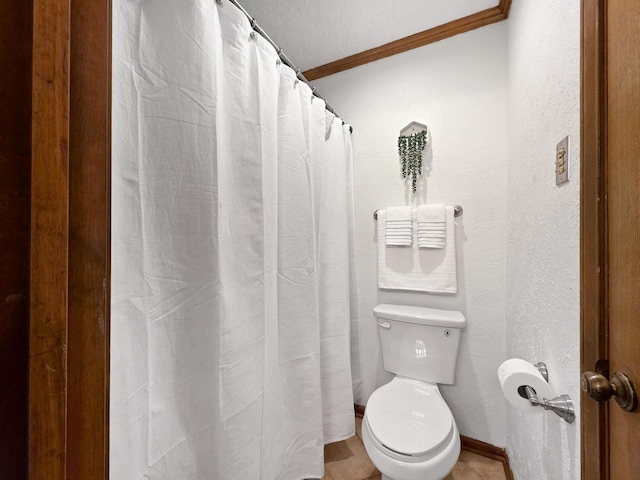 1940 Sams Way, Beaumont, TX 77706 - bathroom with toilet and ornamental molding