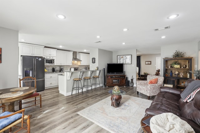 living room featuring light hardwood / wood-style flooring