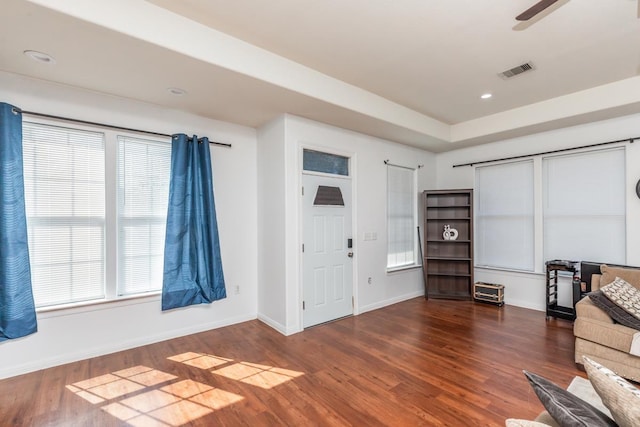 unfurnished room with ceiling fan and dark hardwood / wood-style floors