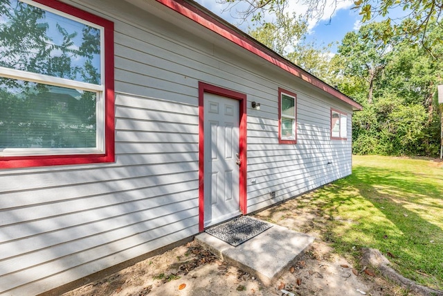 exterior space with a lawn