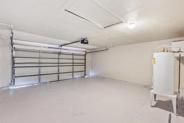 garage featuring a garage door opener and water heater